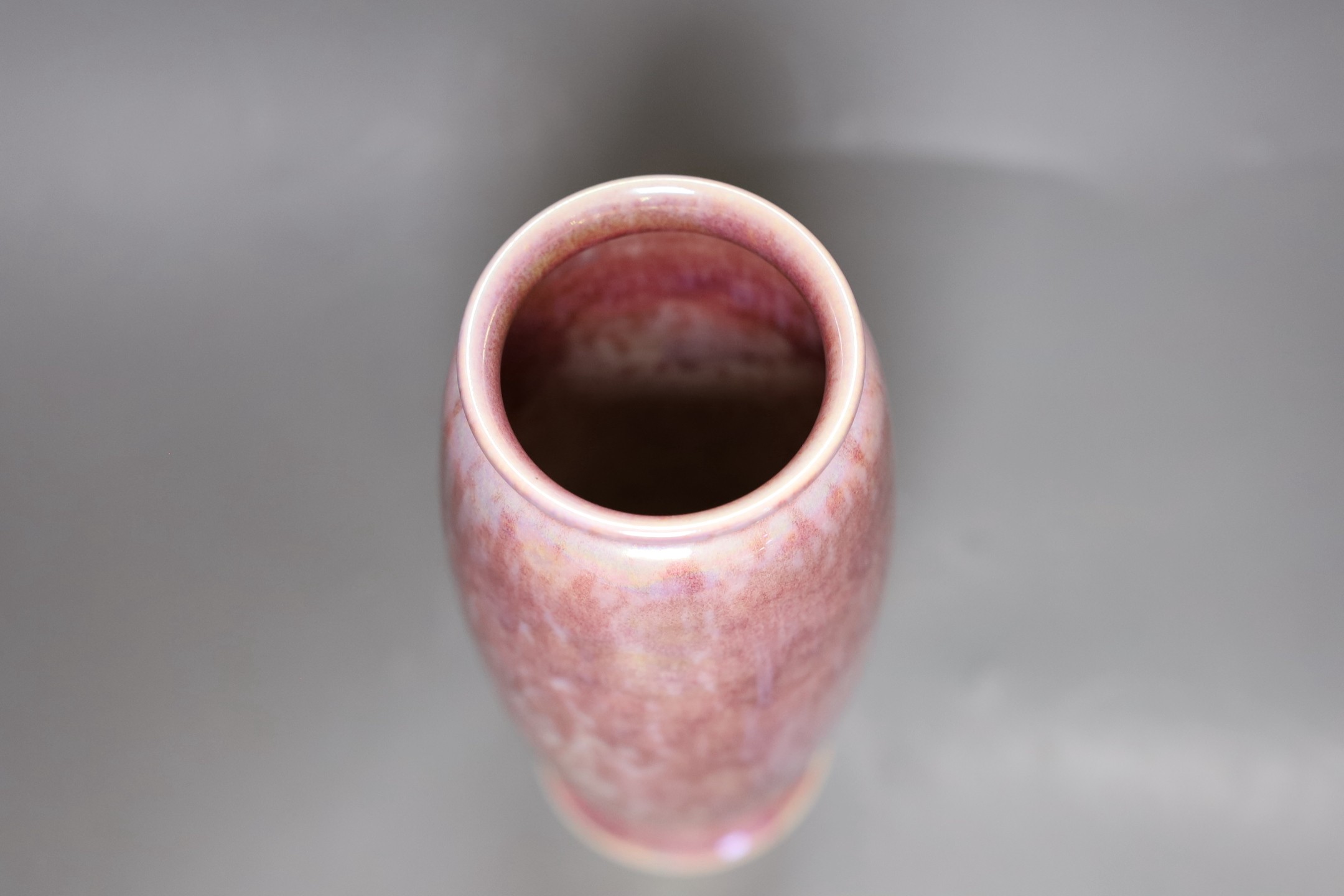 A Ruskin crimson lustre glazed monochrome vase, dated 1925, 22cm